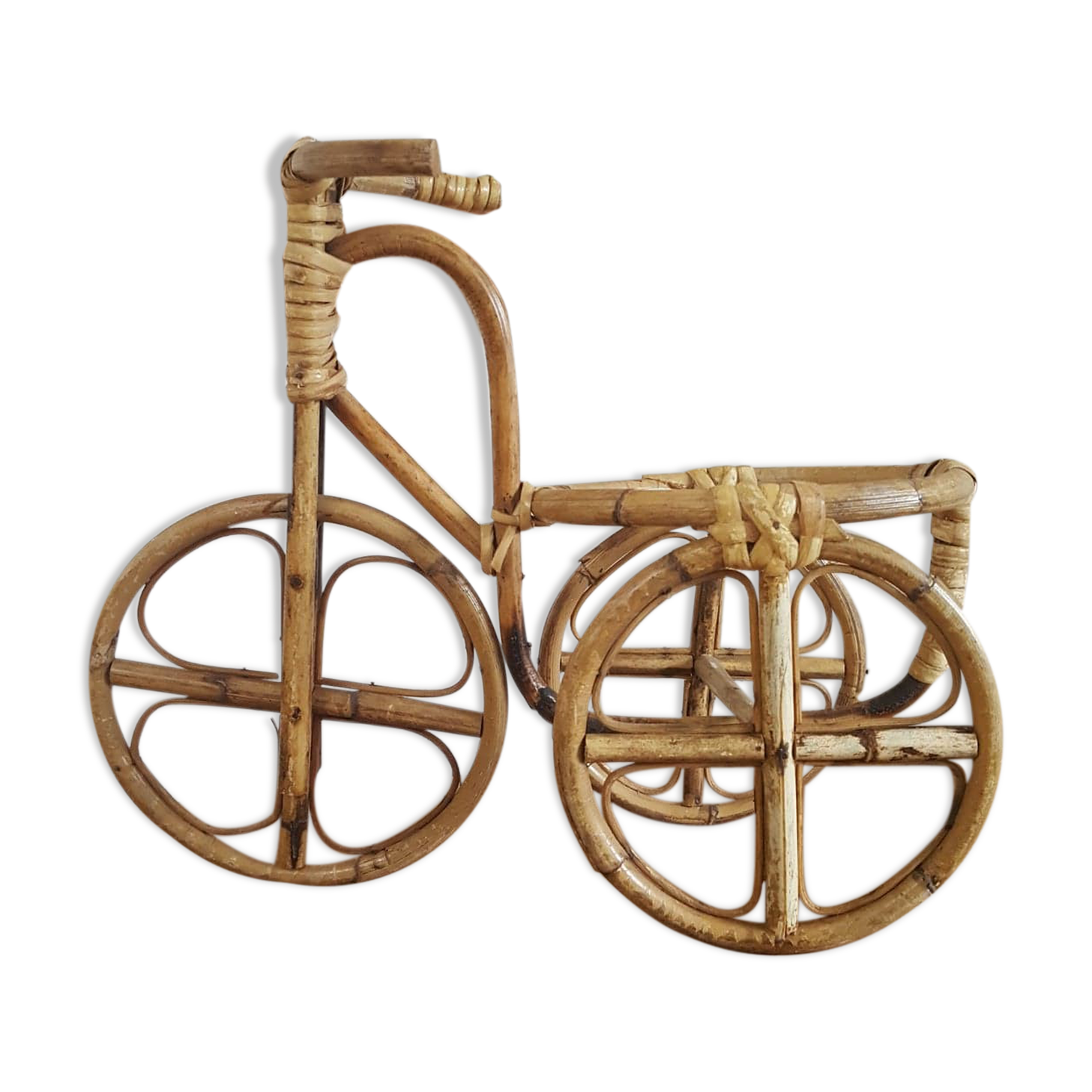 Rattan tricycle plant door