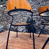 Pair of wooden and black metal chairs