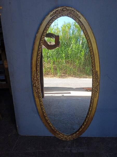 Oval mirror 134cm wood and gilded stucco early 20th century