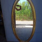 Oval mirror 134cm wood and gilded stucco early 20th century
