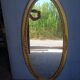 Miroir ovale 134cm bois et stuc doré debut XXem