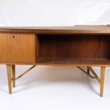 Bureau Bommerang fabriqué en teck et en laiton par Peter Løvig Nielsen pour Hedensted Furniture des années 1960