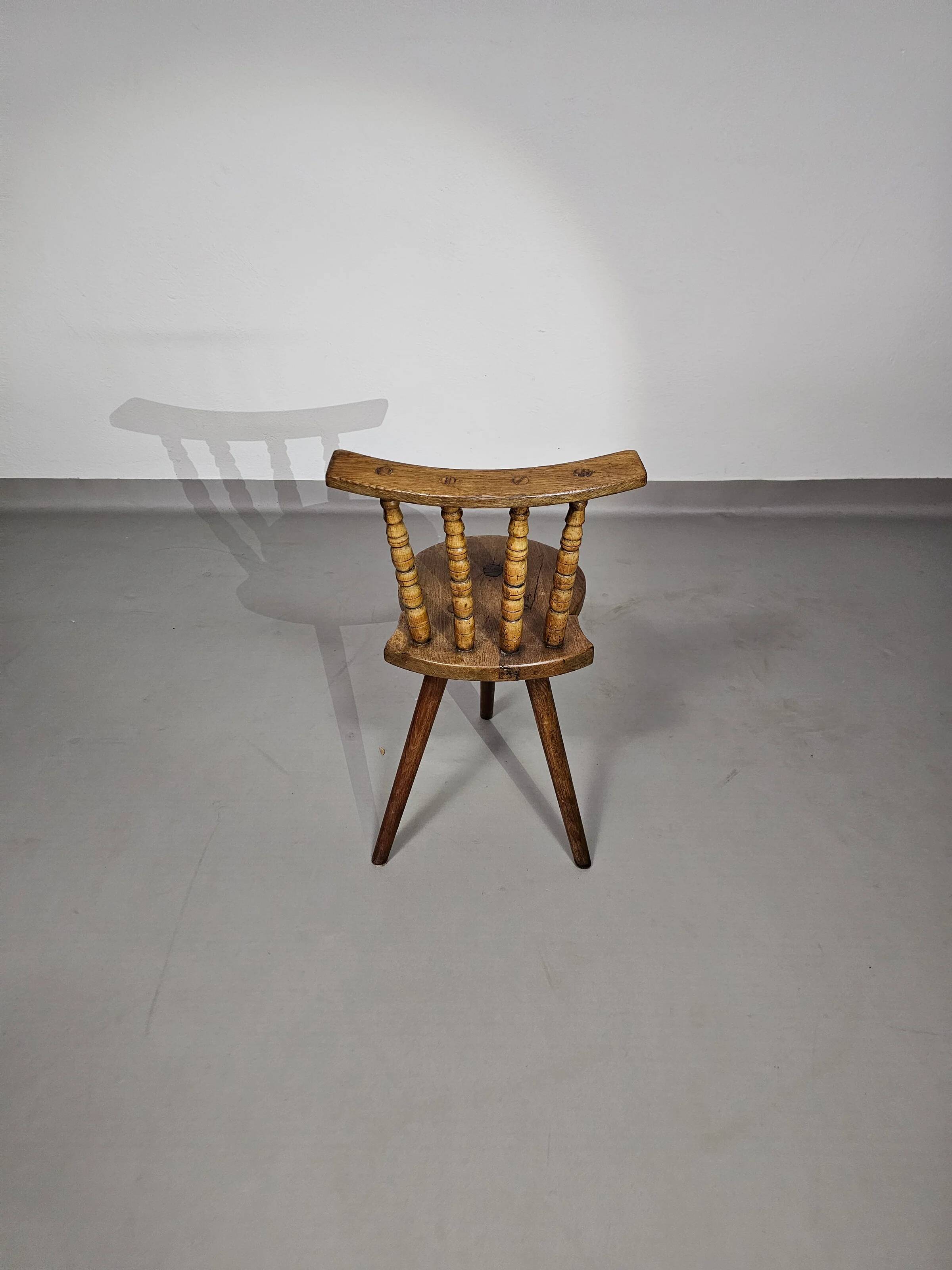 Old farmers tripod chair for decorative use