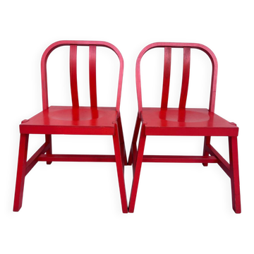 a pair of Nike chairs