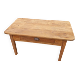 Wooden coffee table with a drawer