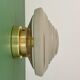 Old glass globe wall/ceiling light in frosted white and gold.