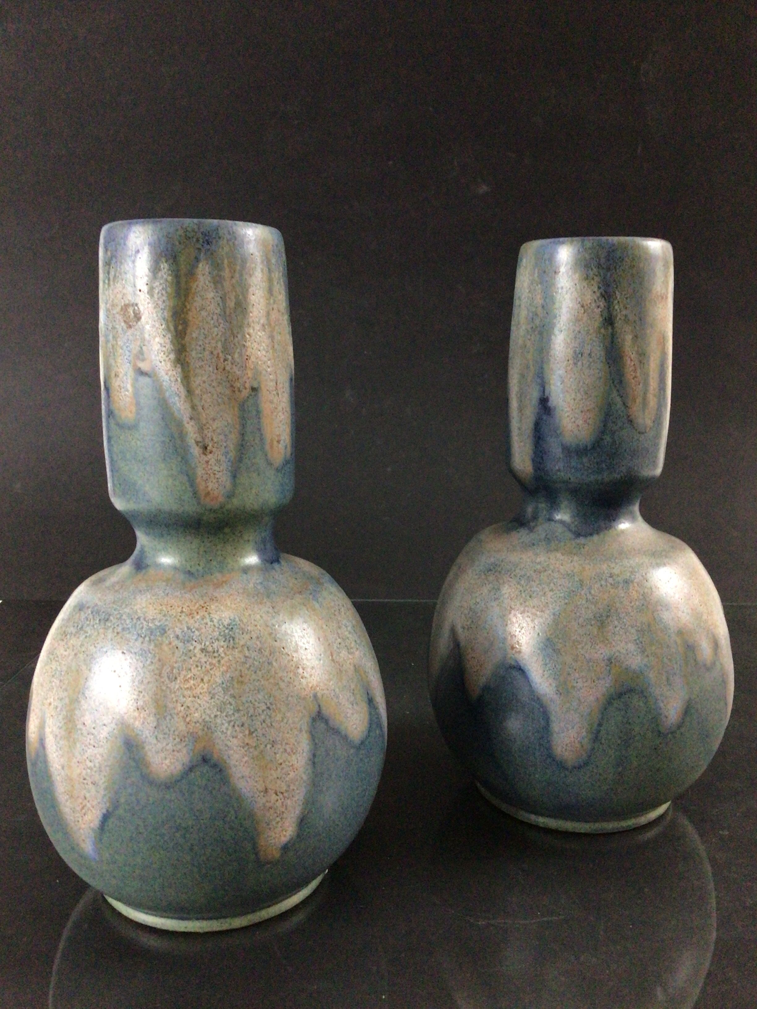 Pair of sandstone vases signed Lebret