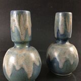 Pair of sandstone vases signed Lebret