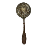 Old sprinkling spoon