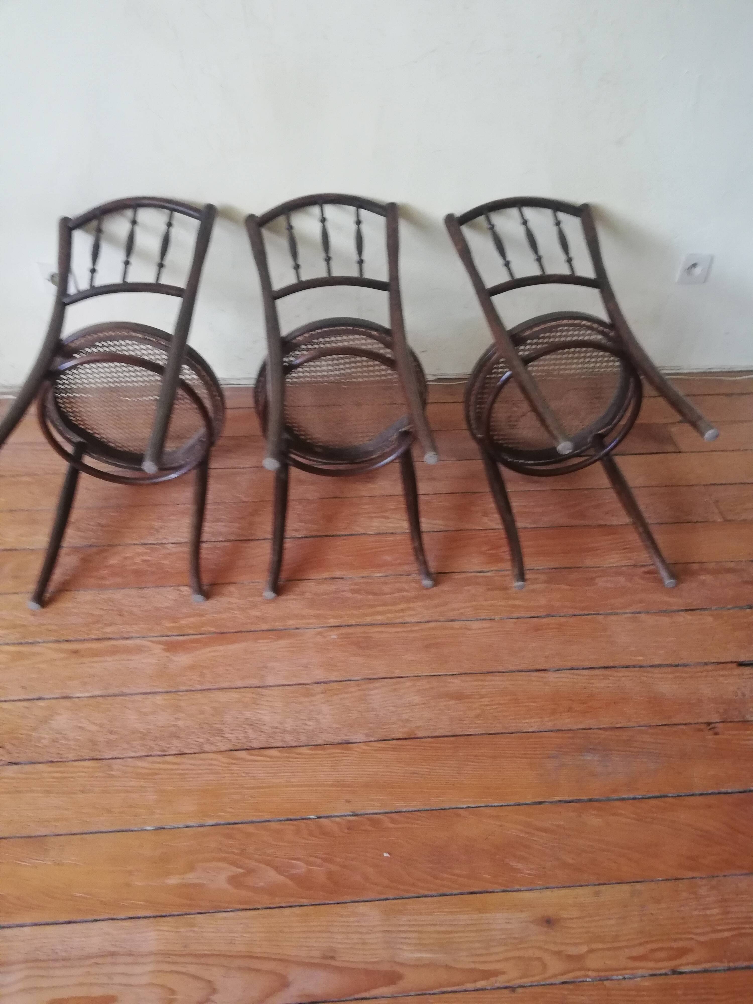 Old curved wooden bistro chairs