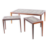 Set of low tables in rosewood and ceramic.