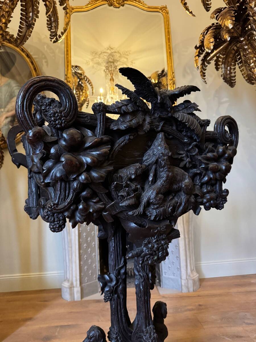 Carved wooden jardinière, Black Forest work, 19th century.