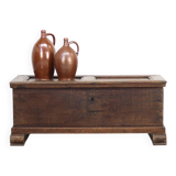 Rustic and weathered antique oak chest from the 18th century.