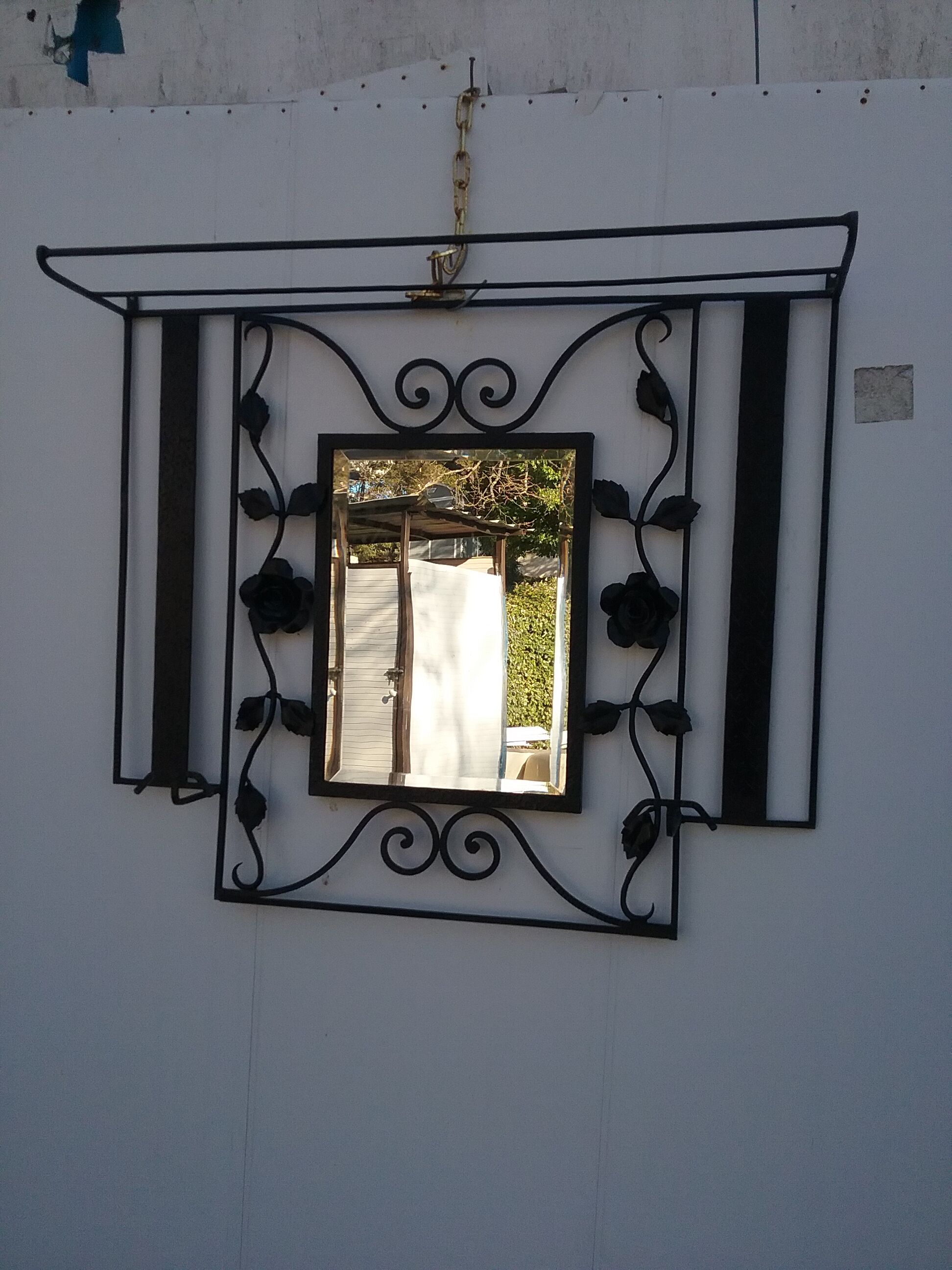 Coat rack in wrought iron art deco