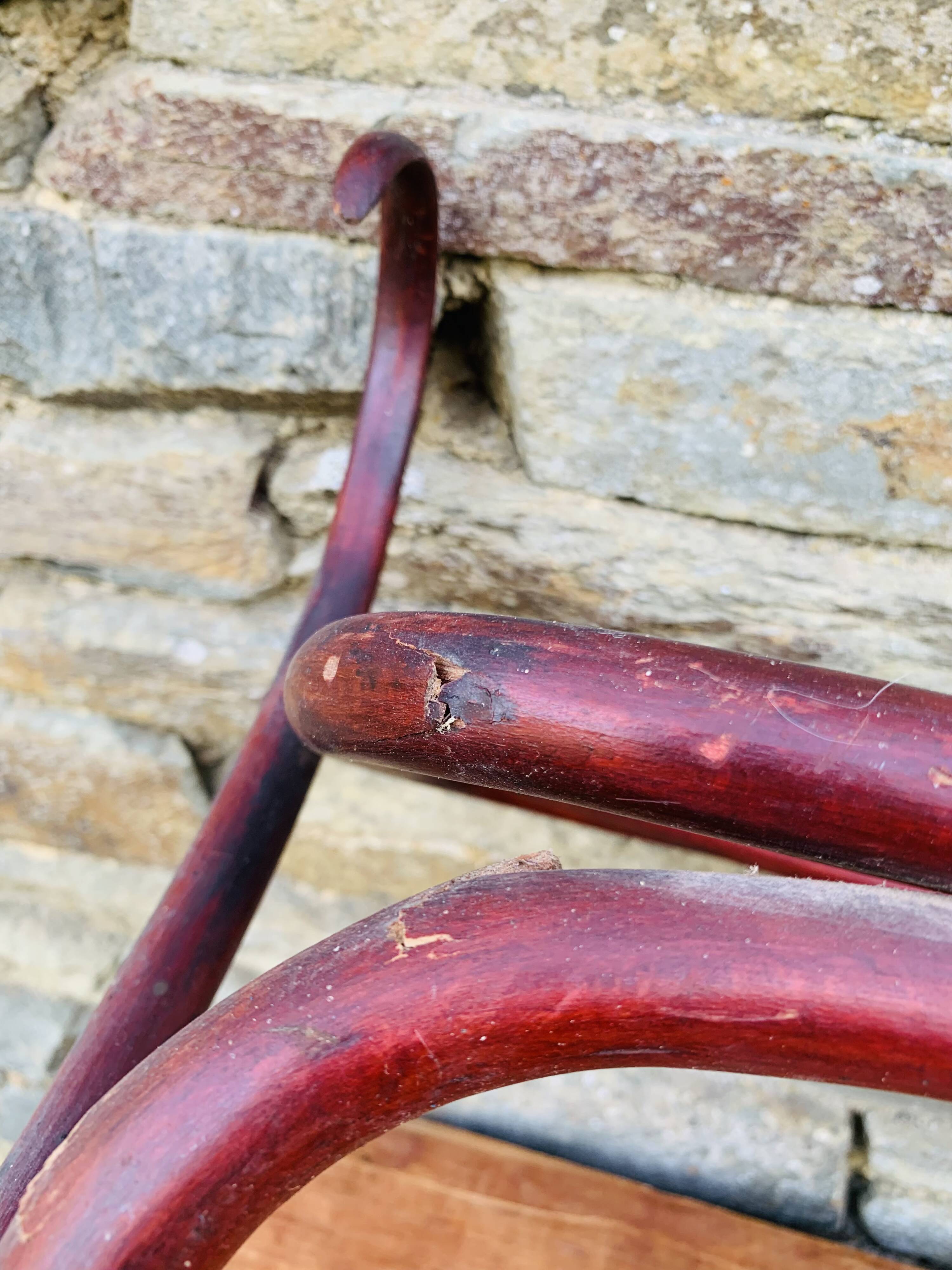 Antique curved wooden wall coat rack