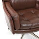 Danish swivel lounge chair in brown leather