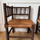 Pair of rush-seated chairs by the fireside "bobbin"