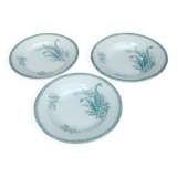 Set of three iron earthenware plates from the St Amandinoise earthenware factory, lily of the valley model.