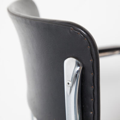 Tubax cantilever chair with black armrest