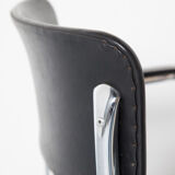 Tubax cantilever chair with black armrest