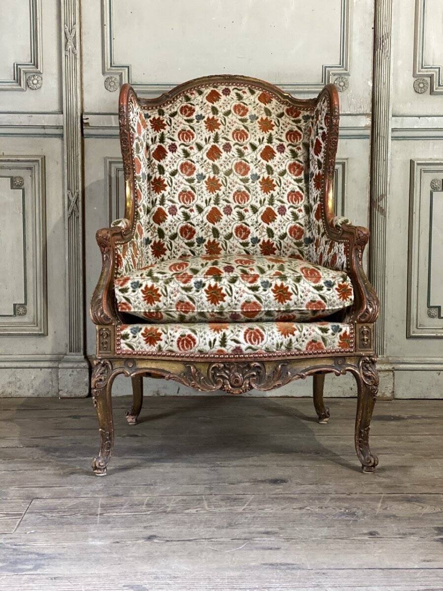 Regency style armchair in gilded wood