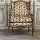 Regency style armchair in gilded wood
