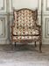 Fauteuil de style Régence en bois doré