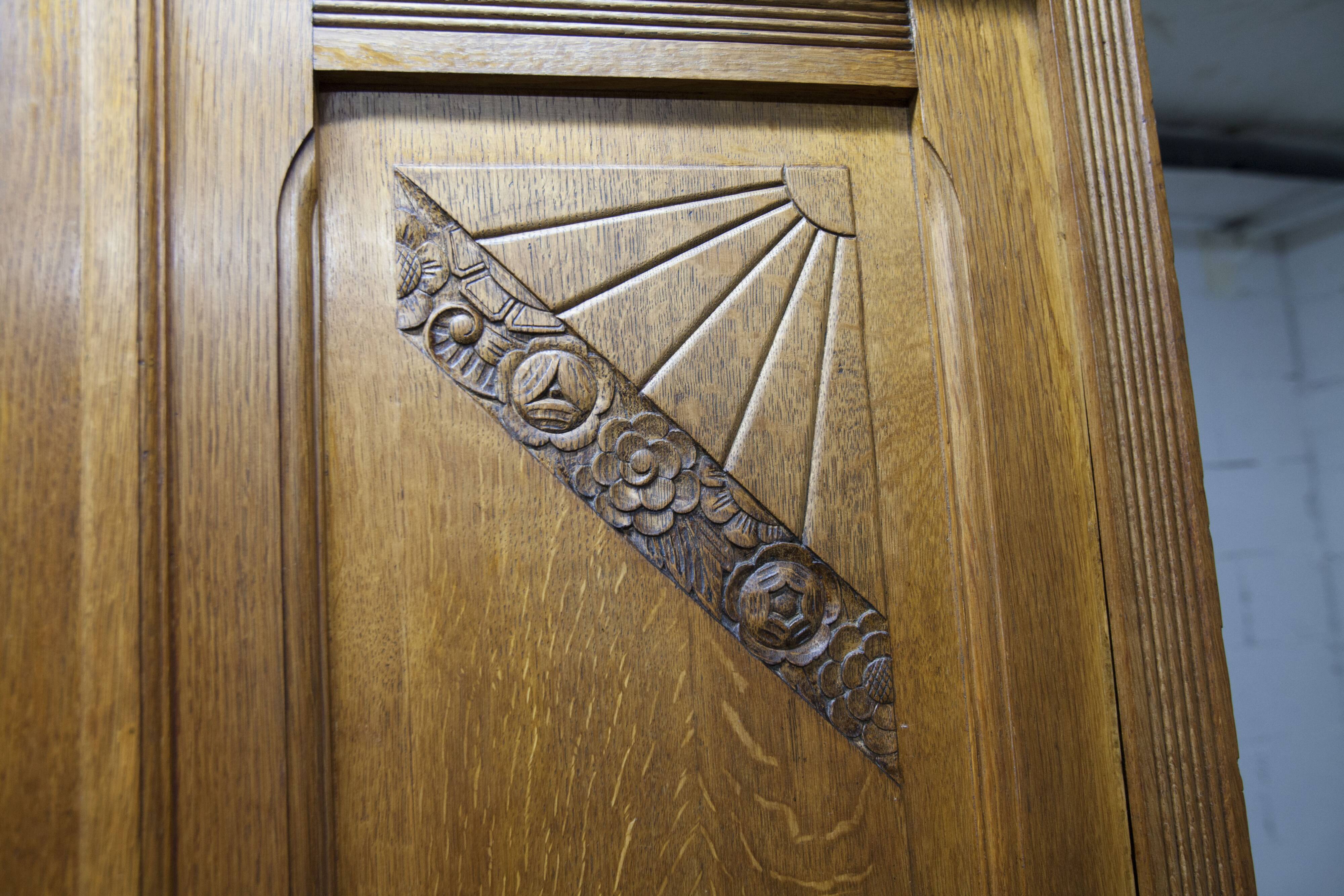 Art Deco carved oak wardrobe - Flemish workshop circa 1930
