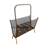 Perforated metal magazine door