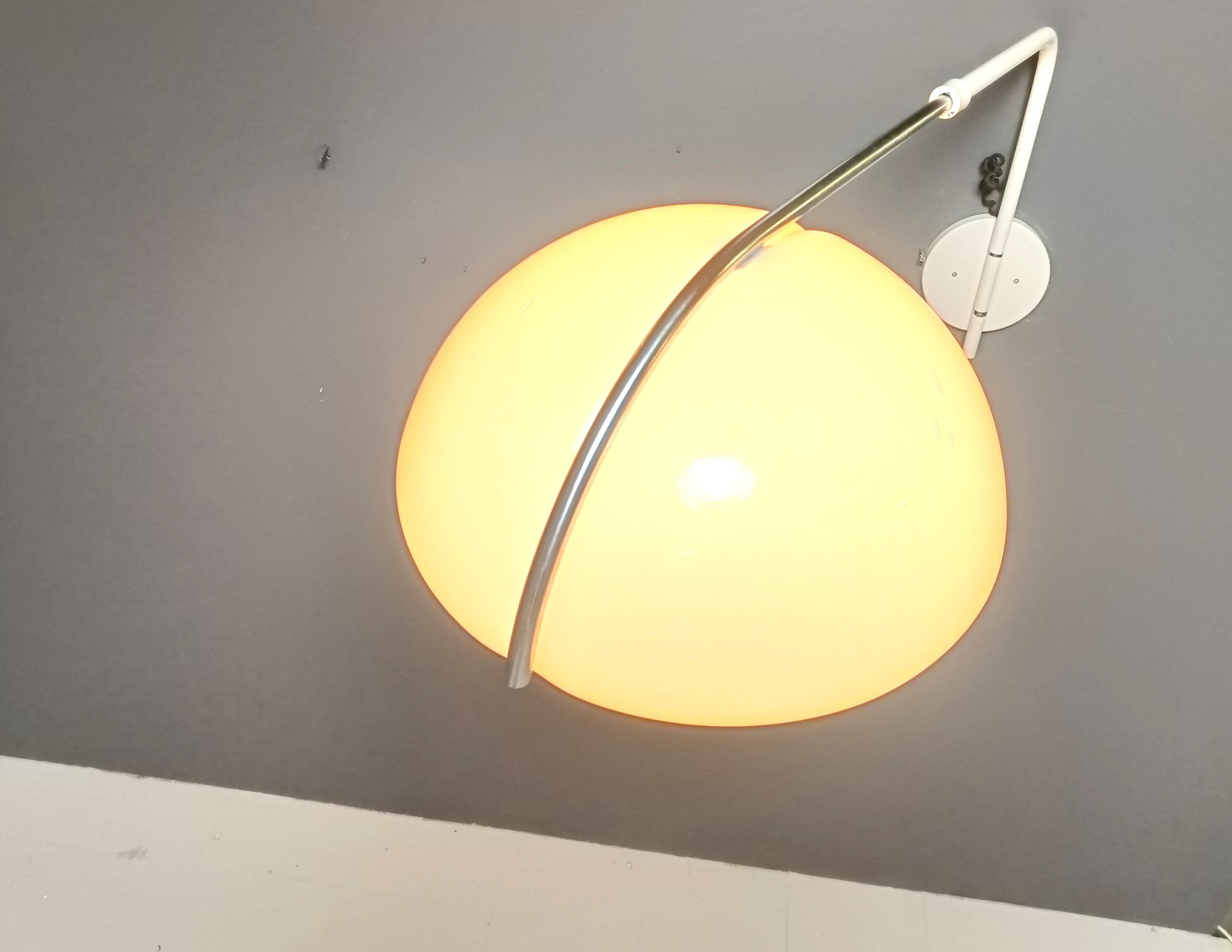Vintage wall lamp by Luigi Massoni for Guzzini, 1970s