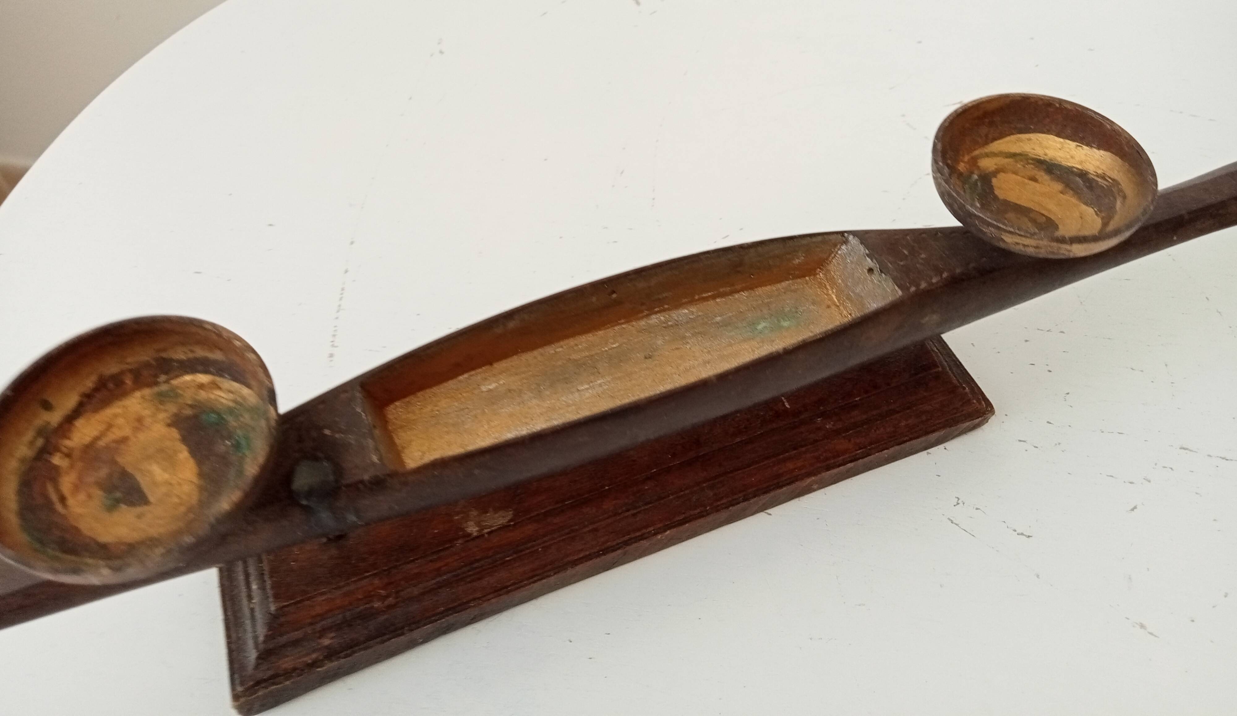 Vintage chandelier in solid carved teak.