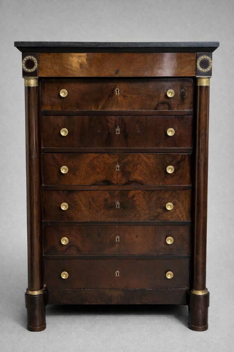 Empire period chest of drawers, early 19th century, in flame mahogany.