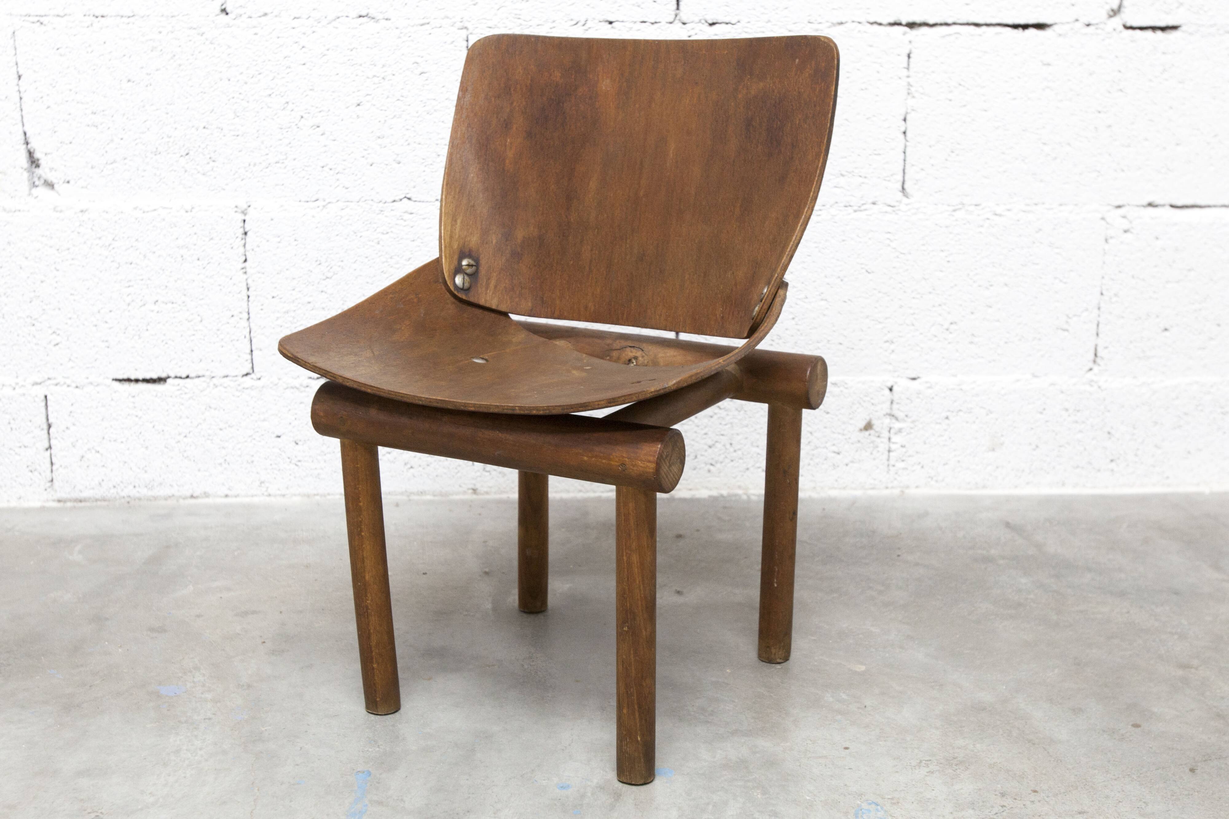 Atypical 1960s curved wood children's chair