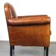 Vintage sheep leather armchair/design armchair with a beautiful look