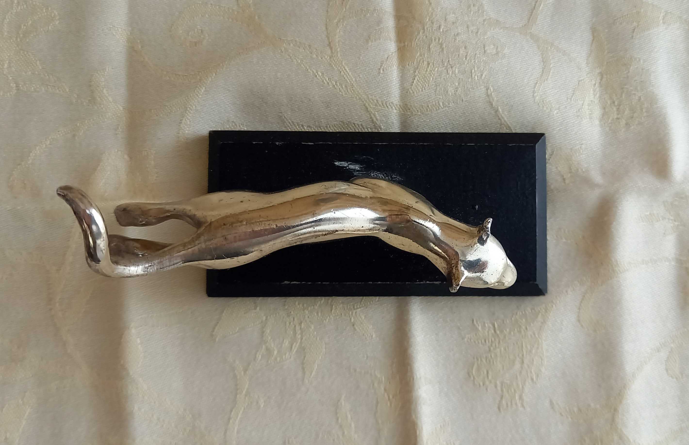 Silver tin paper press