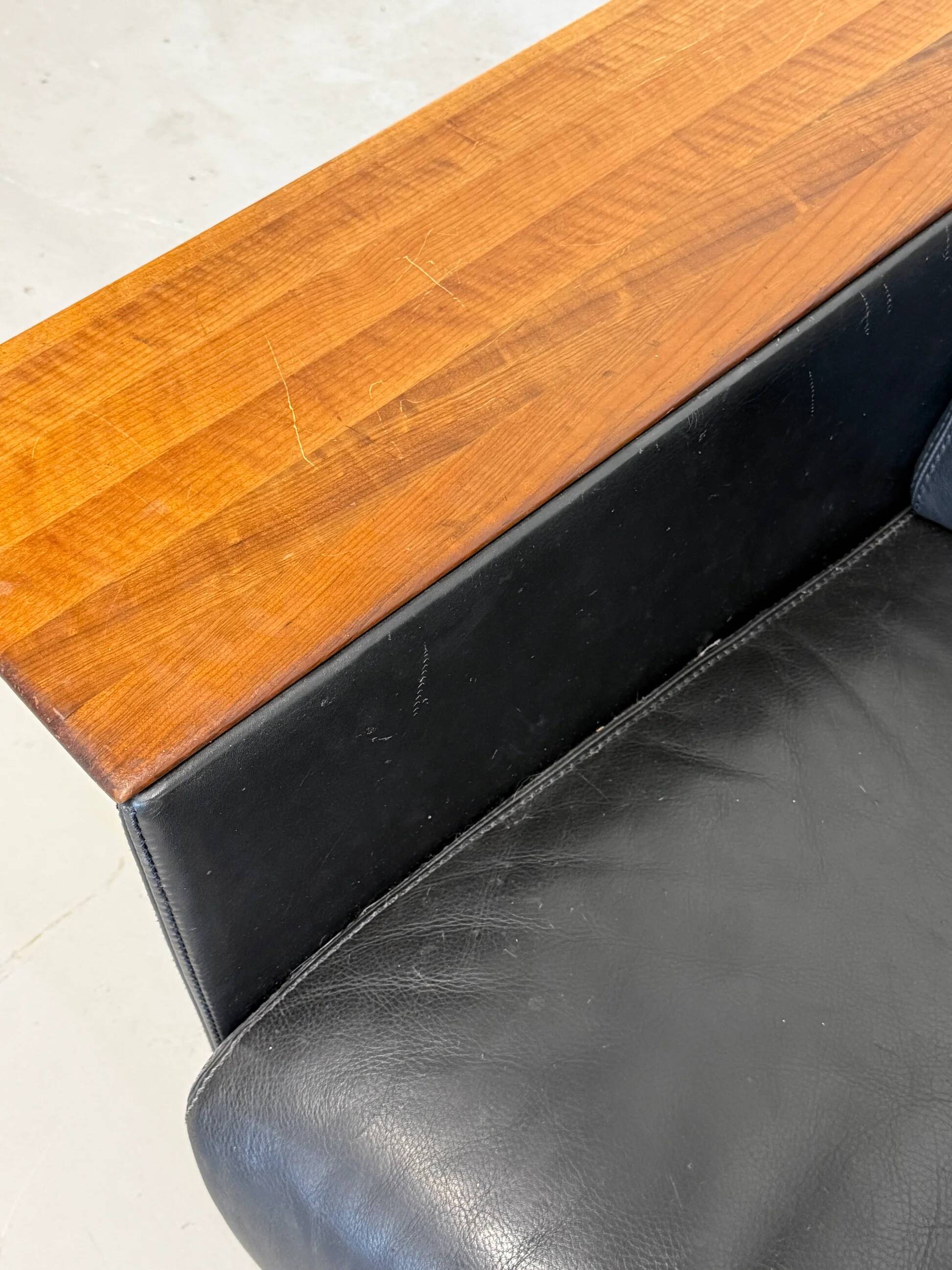 Vintage Black Leather Loveseat with Cantilevered Walnut Tray Arms