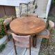 Extendable round dining table and 4 Baumann chairs.