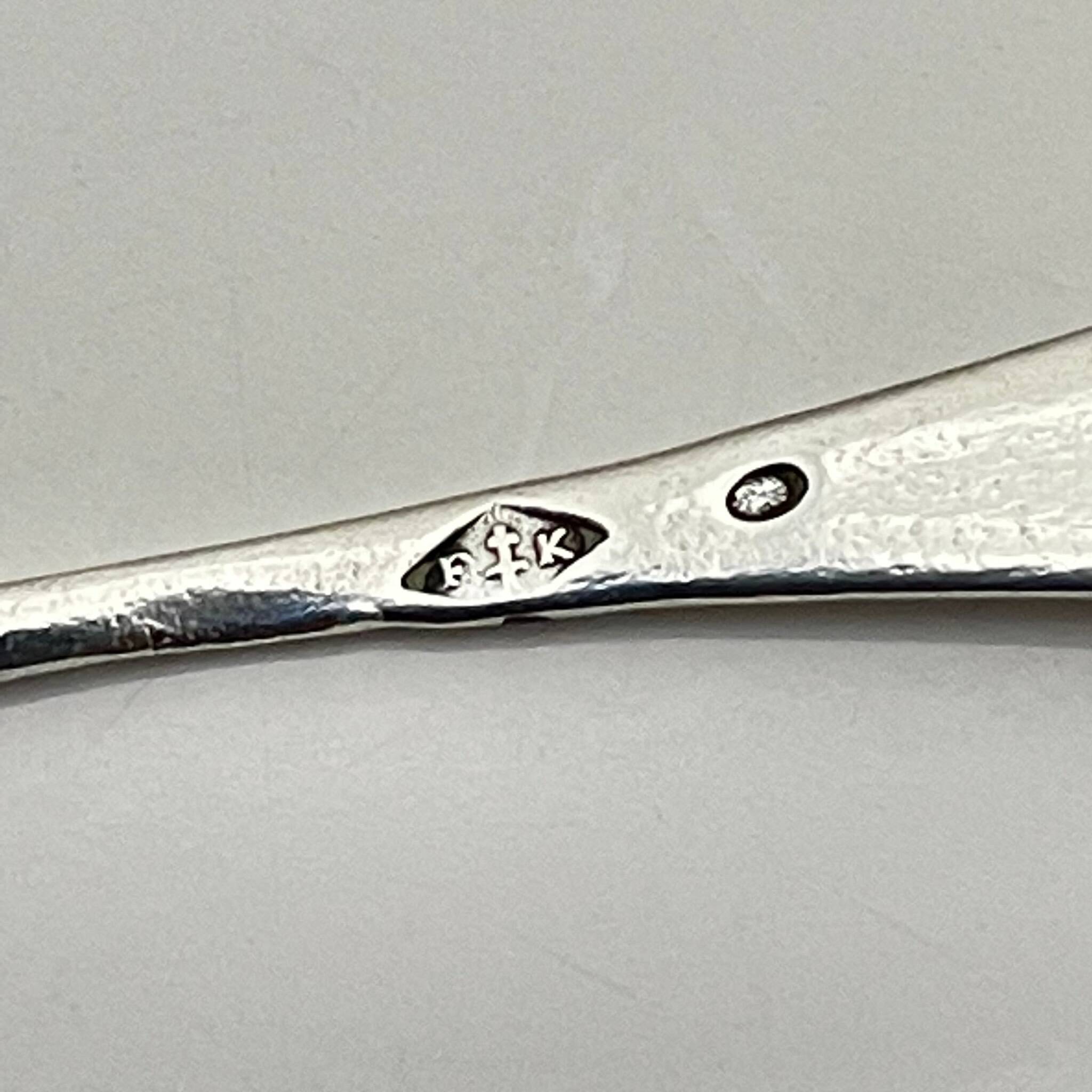 Pair of silver salt cellars and spoons