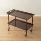 Classic serving trolley from the 1960s, solid Macoré frame with two Macoré veneer shelves and brass castors