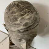Bust of a young man in plaster signed Gerard Choain XX century