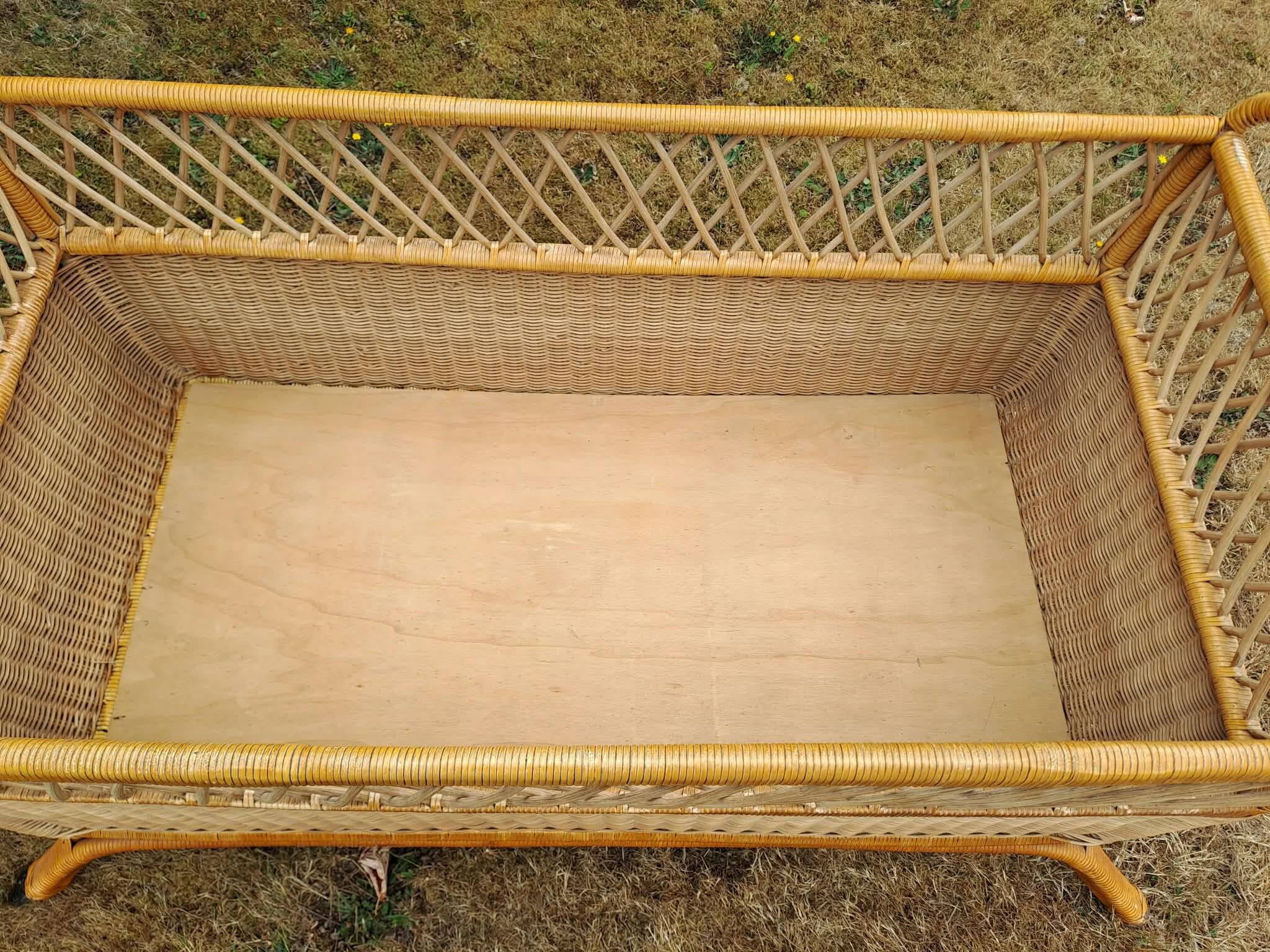 Rattan cradle.