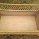 Rattan cradle.