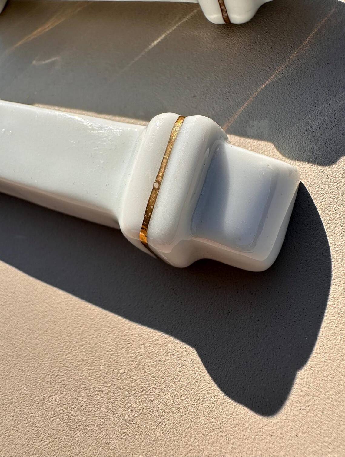 Vintage Knife Rest in White Porcelain with Gold Trim