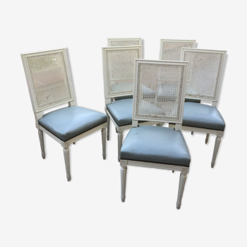 6 chaises de style Louis XVI à dossier canné et assise de cuir