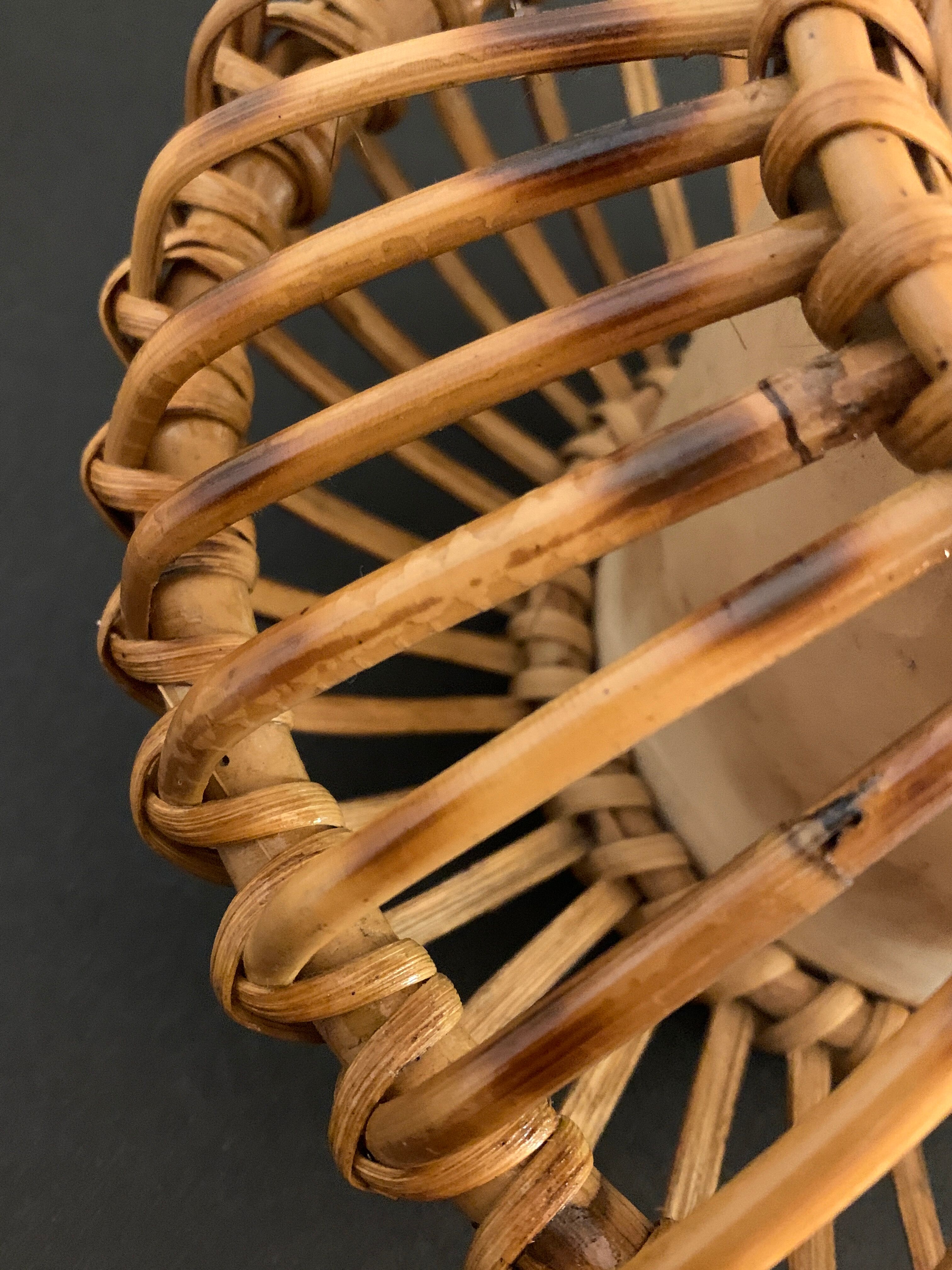 Rattan lamp in the shape of an ellipse Louis Sognot 1950