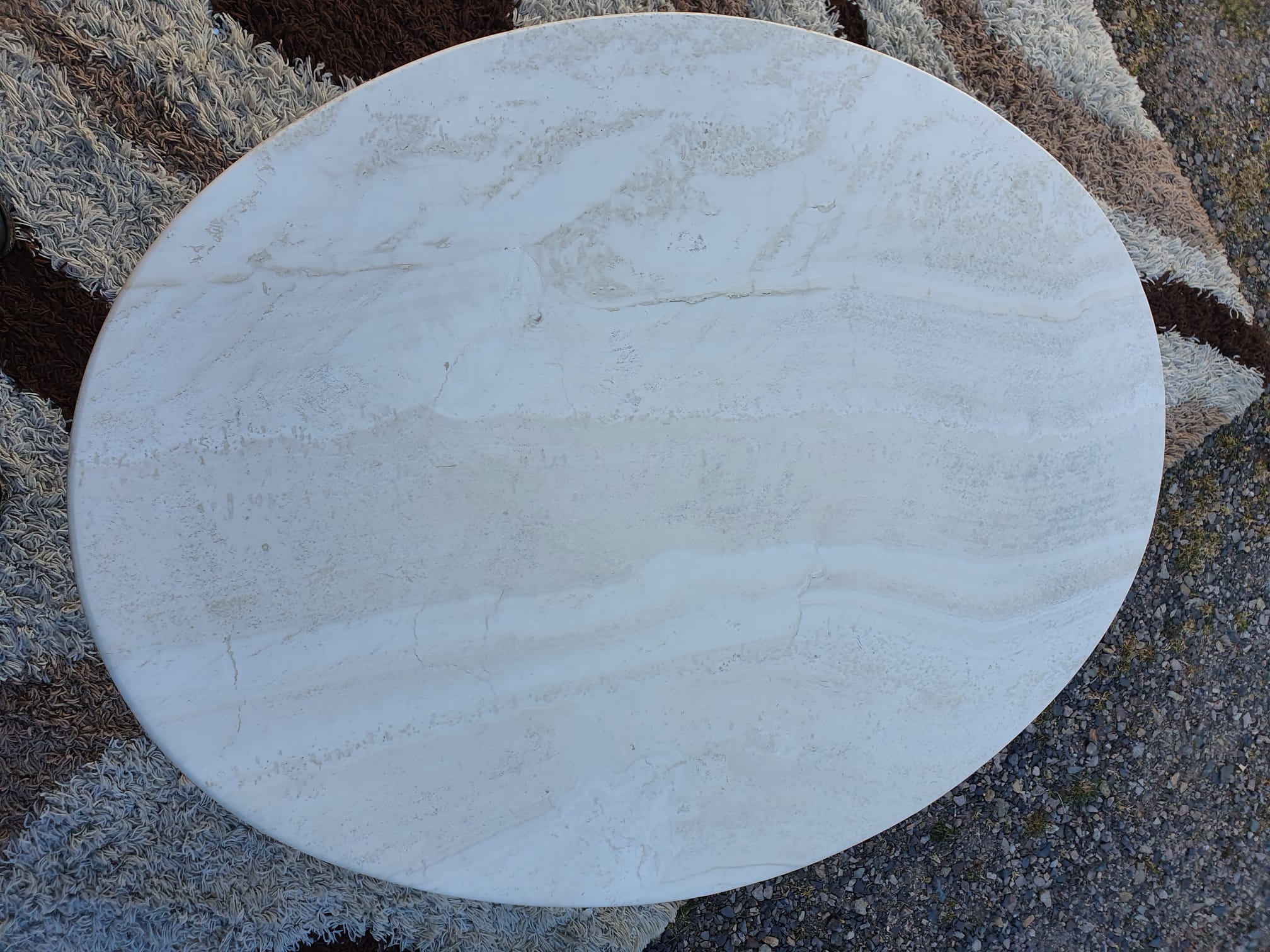 Oval travertine coffee table