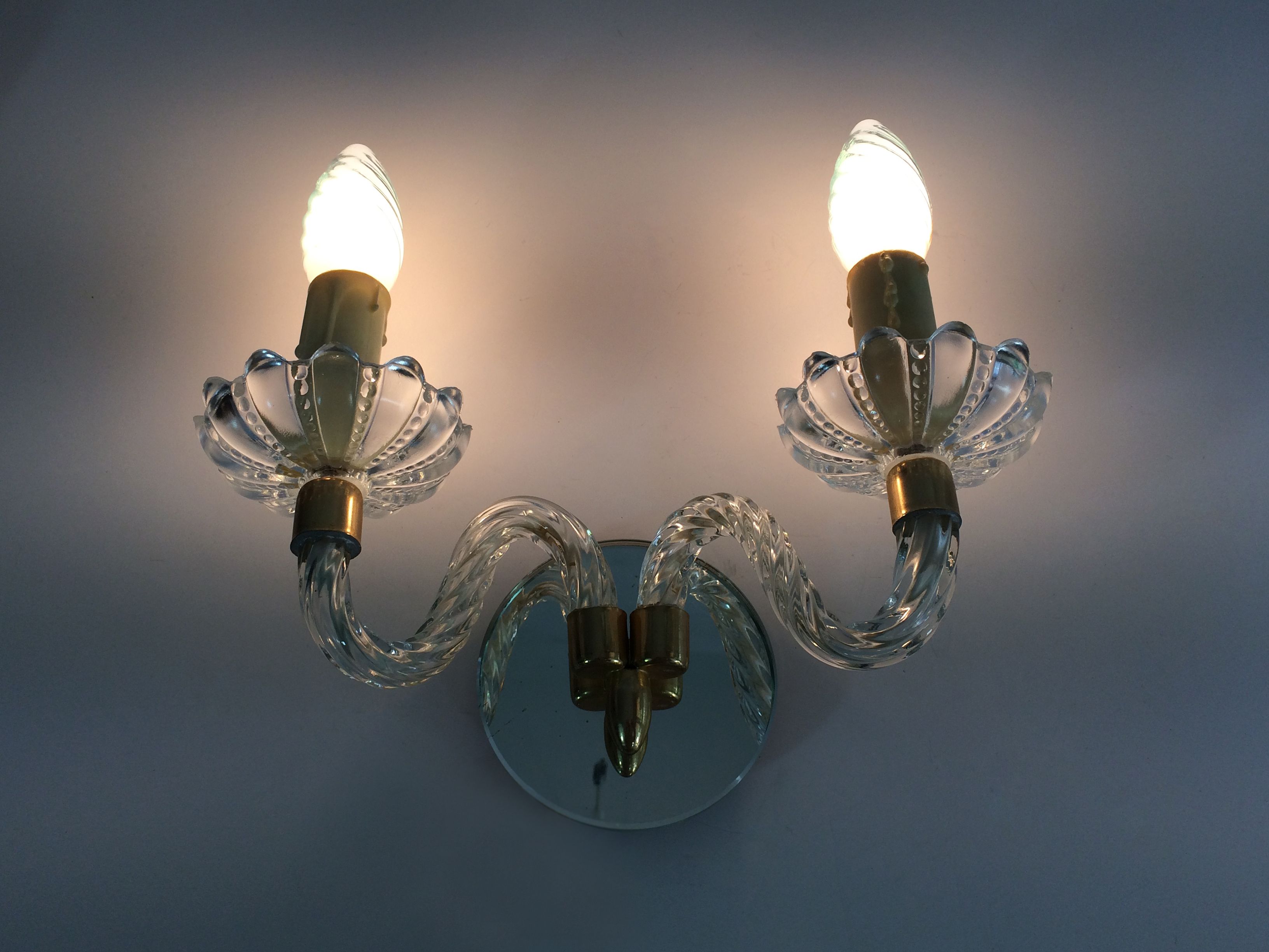Magnificent pair of vintage wall sconces in glass and mirror, Murano style. Year 70
