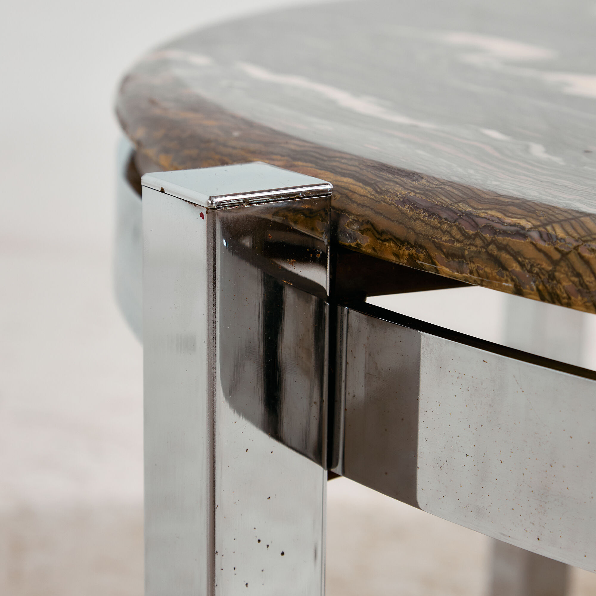Coffee table with a stone top.