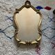 Golden rock mirror