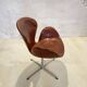 First edition Arne Jacobsen Swan chair, original patinated leather, 1950s